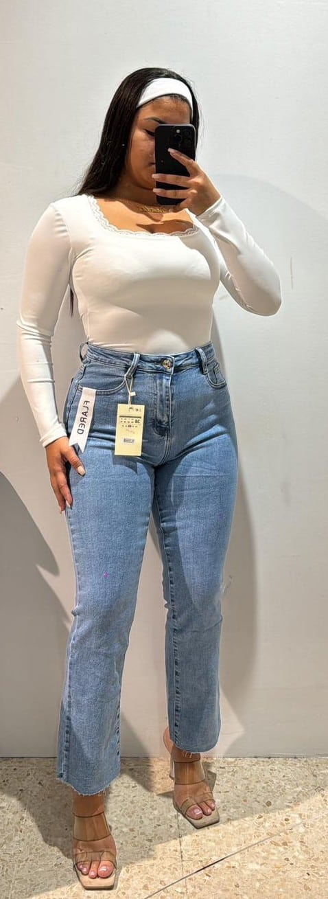 Imagen de WhatsApp 2025-11-12 a las 18.33.05_9fac9669 VAQUERO FLARED CLARO - Imagen 1