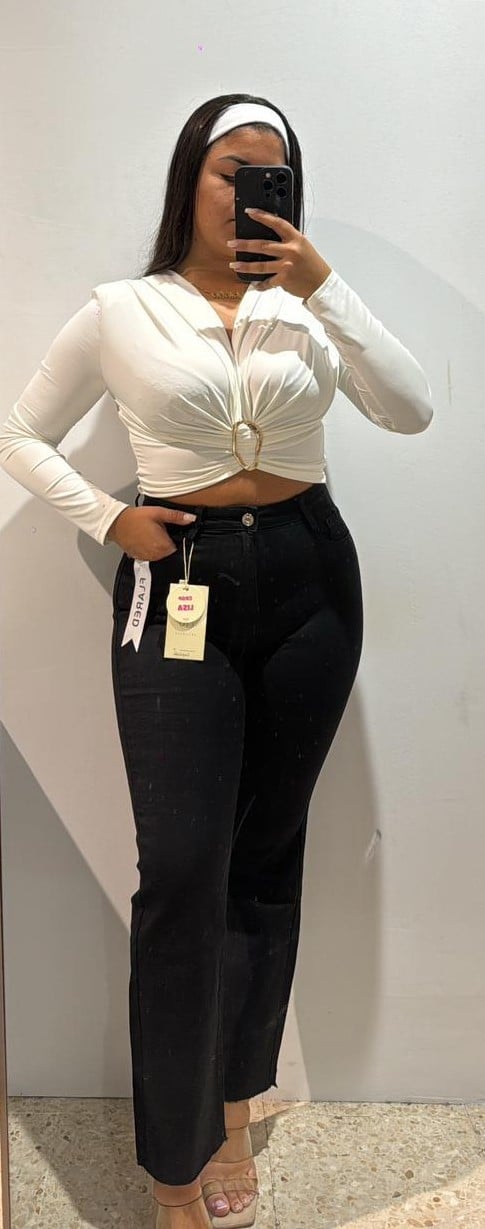 Imagen de WhatsApp 2025-11-12 a las 18.42.08_bd951d8f VAQUERO FLARED OSCURO - Imagen 1