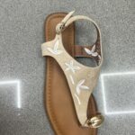 CHANCLA FLORES ANILLOS BEIGE