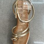 SANDALIA ANILLO DORADA
